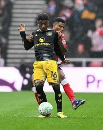 Amad Diallo of Manchester United, ManU and Reinildo Mandava of Sunderland Sunderland v Manchester United, Premier League, Football, Stadium of Light, Sunderland , UK - 09 May 2026Sunderland Stadium of Light United Kingdom EDITORIAL USE ONLY No use with unauthorised audio, video, data, fixture lists, club league logos or live services. Online in-match use limited to 120 images, no video emulation. No use in betting, games or single club league player publications. Copyright: xAnnaxGowthorpe Shutterstockx 16861687k