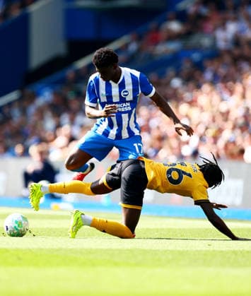 Carlos Baleba of Brighton and Hove Albion and Mateus Mane of Wolverhampton Wanderers. Brighton and Hove Albion v Wolverhampton Wanderers, Premier League, Football, American Express Community Stadium, Brighton , UK - 09 May 2026Brighton American Express Community Stadi United Kingdom EDITORIAL USE ONLY No use with unauthorised audio, video, data, fixture lists, club league logos or live services. Online in-match use limited to 120 images, no video emulation. No use in betting, games or single club league player publications. Copyright: xJamesxMarsh Shutterstockx 16861685bd