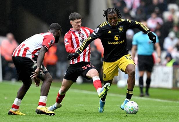 Patrick Dorgu of Manchester United, ManU is fouled by Trai Hume of Sunderland Sunderland v Manchester United, Premier League, Football, Stadium of Light, Sunderland , UK - 09 May 2026Sunderland Stadium of Light United Kingdom EDITORIAL USE ONLY No use with unauthorised audio, video, data, fixture lists, club league logos or live services. Online in-match use limited to 120 images, no video emulation. No use in betting, games or single club league player publications. Copyright: xAnnaxGowthorpe Shutterstockx 16861687w