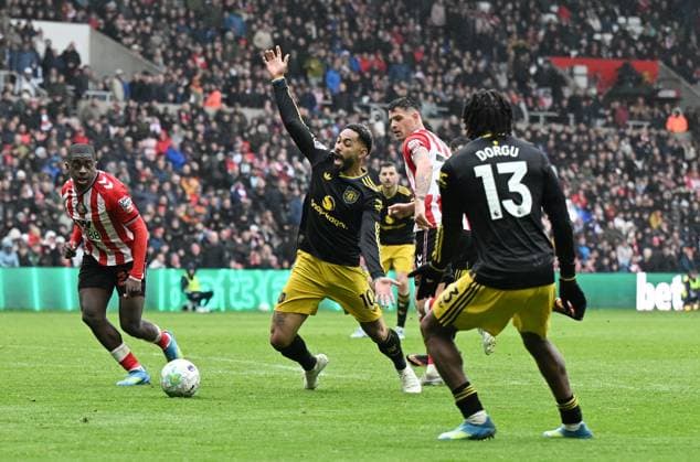Matheus Cunha of Manchester United, ManU goes down in the box after a challenge from Granit Xhaka of Sunderland but no penalty is given Sunderland v Manchester United, Premier League, Football, Stadium of Light, Sunderland , UK - 09 May 2026Sunderland Stadium of Light United Kingdom EDITORIAL USE ONLY No use with unauthorised audio, video, data, fixture lists, club league logos or live services. Online in-match use limited to 120 images, no video emulation. No use in betting, games or single club league player publications. Copyright: xAnnaxGowthorpe Shutterstockx 16861687y