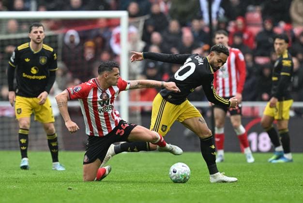 Granit Xhaka of Sunderland and Matheus Cunha of Manchester United, ManU Sunderland v Manchester United, Premier League, Football, Stadium of Light, Sunderland , UK - 09 May 2026Sunderland Stadium of Light United Kingdom EDITORIAL USE ONLY No use with unauthorised audio, video, data, fixture lists, club league logos or live services. Online in-match use limited to 120 images, no video emulation. No use in betting, games or single club league player publications. Copyright: xAnnaxGowthorpe Shutterstockx 16861687bg