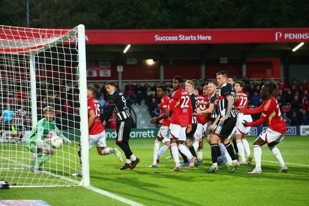 Kieran Green of Grimsby Town (hidden) scores to make it 1-1 Salford City v Grimsby Town, EFL Sky Bet League Two, Play-Off Semi Final, Second Leg, Football, Peninsula Stadium, Salford, UK - 15 May 2026Salford Peninsula Stadium United Kingdom EDITORIAL USE ONLY No use with unauthorised audio, video, data, fixture lists, club league logos or live services. Online in-match use limited to 120 images, no video emulation. No use in betting, games or single club league player publications. Copyright: xPaulxCurrie Shutterstockx 16876823cg