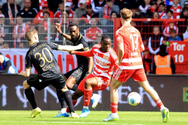 DEU, DFL, 1. FBL, 1.FC Union vs. FC Augsburg, 16.05.2026, Stadion Alte Foersterei, Berlin, DEU, DFL, 1. FBL, 1.FC Union vs. FC Augsburg, im Bild: Ilyas Ansah (1.FC Union Berlin 10), Andras Schaefer (1.FC Union Berlin 13), Chrislain Matsima (FC Augsburg 5), Anton Kade (FC Augsburg 30) DFL - regulations prohibit any use of Photographs as image sequences and or quasi-video