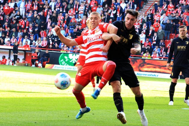 DEU, DFL, 1. FBL, 1.FC Union vs. FC Augsburg, 16.05.2026, Stadion Alte Foersterei, Berlin, DEU, DFL, 1. FBL, 1.FC Union vs. FC Augsburg, im Bild: Dmytro Bogdanov (1.FC Union Berlin 30), CEDRIC ZESIGER (FC Augsburg 16) DFL - regulations prohibit any use of Photographs as image sequences and or quasi-video