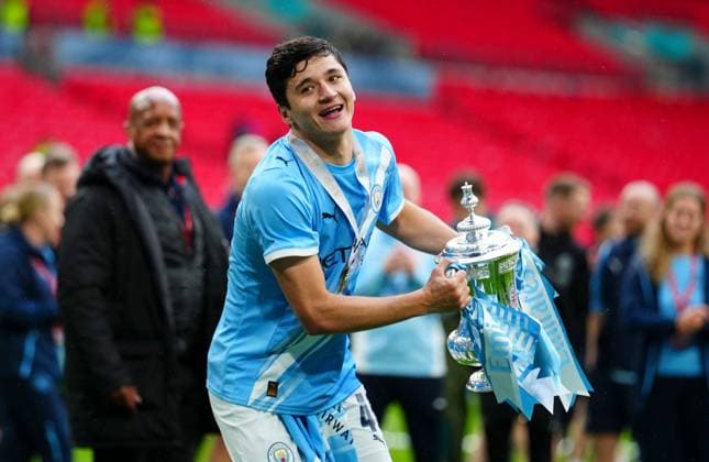 Abdukodir Khusanov of Manchester City celebrates Chelsea v Manchester City, Emirates FA Cup Final, Football, Wembley Stadium, London, UK - 16 May 2026London Wembley Stadium United Kingdom EDITORIAL USE ONLY No use with unauthorised audio, video, data, fixture lists, club league logos or live services. Online in-match use limited to 120 images, no video emulation. No use in betting, games or single club league player publications. Copyright: xJavierxGarcia Shutterstockx 16876844bz