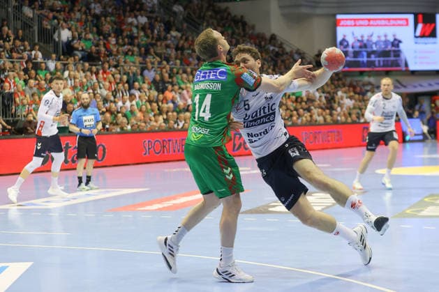 21.05.2026, xtgx, Handball, Daikin HBL, SC Magdeburg - SG Flensburg Handewitt v.l. Omar Ingi Magnusson (Magdeburg, 14) Niclas Kirkelokke (Kirkelökke, Flensburg, 5) Zweikampf, Duell, Kampf, tackle Magdeburg