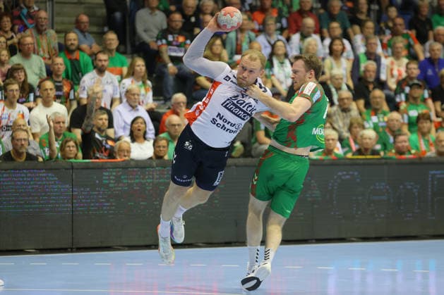 21.05.2026, xtgx, Handball, Daikin HBL, SC Magdeburg - SG Flensburg Handewitt v.l. Simon Pytlick (Flensburg, 2), Felix Claar (Magdeburg, 7) Zweikampf, Duell, Kampf, tackle wirft Tor, Torschuetze, erzielt Tor, Treffer, scores the goal Magdeburg