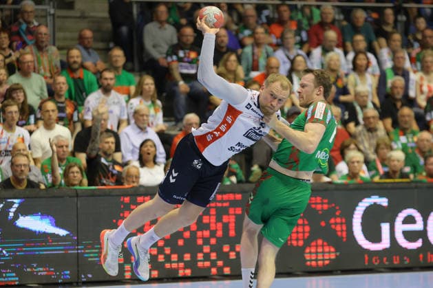21.05.2026, xtgx, Handball, Daikin HBL, SC Magdeburg - SG Flensburg Handewitt v.l. Simon Pytlick (Flensburg, 2), Felix Claar (Magdeburg, 7) Zweikampf, Duell, Kampf, tackle wirft Tor, Torschuetze, erzielt Tor, Treffer, scores the goal Magdeburg