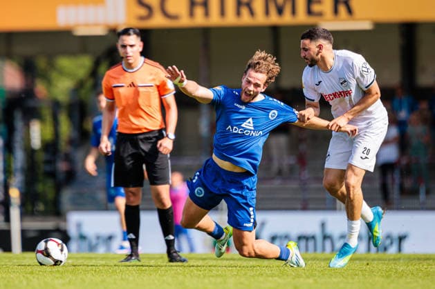 (L-R) Luca Kerkemeyer (SF Lotte, 24), Oualid Mhamdi (SC Verl, 20) im Zweikampf GER, SC Verl vs. SF Lotte, Fussball, Westfalenpokal, Finale, Spielzeit 2025 2026, 23.05.2026 DFL Regulations prohibit any use of photographers as image sequences and or quasi-video. GER, SC Verl vs. SF Lotte, Fussball, Westfalenpokal, Finale, Spielzeit 2025 2026, 23.05.2026 Verl Copyright: xEibner-Pressefoto JanxRollingerx EP_JSK