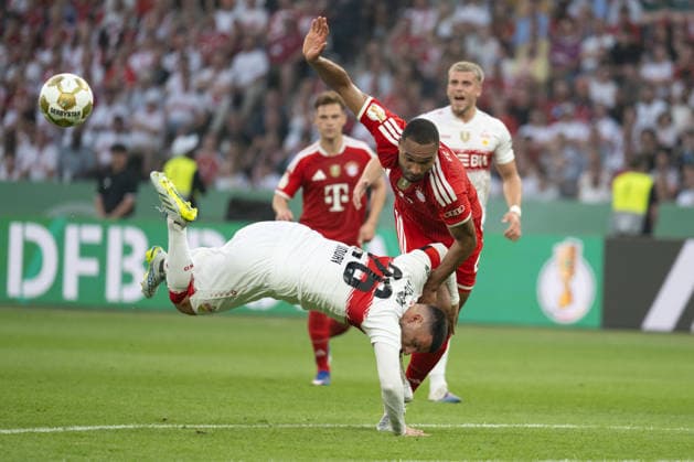 v. li. im Zweikampf Deniz Undav (VfB Stuttgart 26), Jonathan Tah (FC Bayern Muenchen, 04). GER, FC Bayern Muenchen vs. VfB Stuttgart, Fussball, Herren, DFB-Pokal, Finale, Spielzeit 2025 2026, 23.05.2026, DFL DFB REGULATIONS PROHIBIT ANY USE OF PHOTOGRAPHS AS IMAGE SEQUENCES AND OR QUASI-VIDEO, GER, FC Bayern Muenchen vs. VfB Stuttgart, Fussball, Herren, DFB-Pokal, Finale, Spielzeit 2025 2026, 23.05.2026 Berlin Copyright: xEibner-Pressefoto WolfgangxFrankx EP_WFK