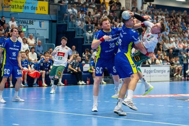 Morten Hempel Jensen, Rueckraum, (TSV GWD Minden 9), Tom Kiesler, Rueckraum, (VfL Gummersbach 30), Štěpan Zeman, Kreislaeufer, (VfL Gummersbach 66), VfL Gummersbach vs. TSV GWD Minden, Daikin Handball Bundesliga, Herren , 30. Spieltag, 23.05.2026 Gummersbach NRW Deutschland