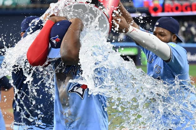 May 23, 2026, Toronto, On, Canada: Toronto Blue Jays outfielder Jesus Sanchez, centre, is doused with water by teammate Vladimir Guerrero Jr, right, to celebrate their team s win over the Pittsburgh Pirates in MLB, Baseball Herren, USA baseball action in Toronto on Saturday, May 23, 2026. Jesus Sanchez, Vladimir Guerrero Jr - ZUMAc35_ 20260523_zaf_c35_151 Copyright: xJonxBlackerx