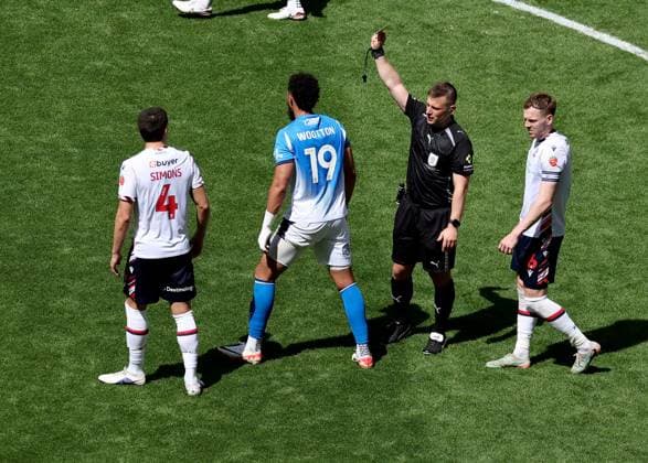 Referee Josh Smith shows a yellow card to Kyle Wootton of Stockport County Bolton Wanderers v Stockport County, EFL Sky Bet League One, Play-Off Final, Football, Wembley Stadium, London, UK - 24 May 2026London Wembley Stadium United Kingdom EDITORIAL USE ONLY No use with unauthorised audio, video, data, fixture lists, club league logos or live services. Online in-match use limited to 120 images, no video emulation. No use in betting, games or single club league player publications. Copyright: xIanxTuttle Shutterstockx 16889808dc