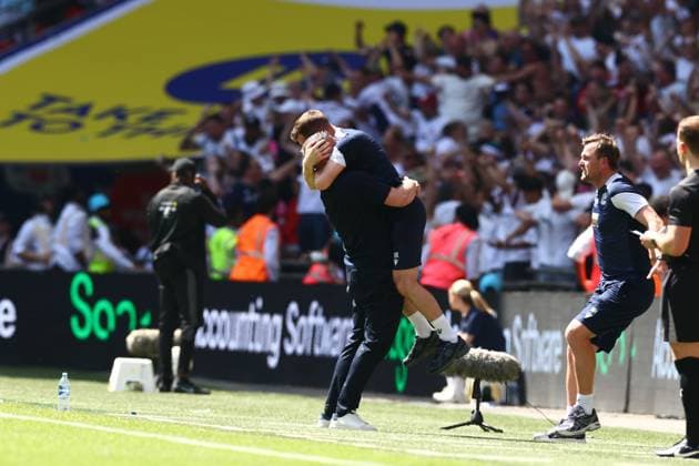 Bolton Wanderers manager Steven Schumacher and his staff celebrate the third goal scored by Sam Dalby of Bolton Wanderers 1-3 Bolton Wanderers v Stockport County, EFL Sky Bet League One, Play-Off Final, Football, Wembley Stadium, London, UK - 24 May 2026London Wembley Stadium United Kingdom EDITORIAL USE ONLY No use with unauthorised audio, video, data, fixture lists, club league logos or live services. Online in-match use limited to 120 images, no video emulation. No use in betting, games or single club league player publications. Copyright: xJamesxMarsh Shutterstockx 16889809ce