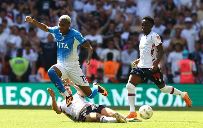 Malik Mothersille of Stockport County tackled by Ruben Rodrigues of Bolton Wanderers Bolton Wanderers v Stockport County, EFL Sky Bet League One, Play-Off Final, Football, Wembley Stadium, London, UK - 24 May 2026London Wembley Stadium United Kingdom EDITORIAL USE ONLY No use with unauthorised audio, video, data, fixture lists, club league logos or live services. Online in-match use limited to 120 images, no video emulation. No use in betting, games or single club league player publications. Copyright: xJamesxMarsh Shutterstockx 16889809ci