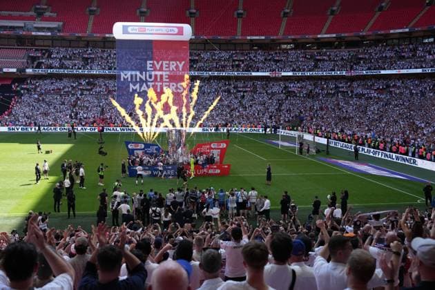 League One Play off final Winning club celebrations on winners boards, Bolton Wanderers players Bolton Wanderers v Stockport County, EFL Sky Bet League One, Play-Off Final, Football, Wembley Stadium, London, UK - 24 May 2026London Wembley Stadium United Kingdom EDITORIAL USE ONLY No use with unauthorised audio, video, data, fixture lists, club league logos or live services. Online in-match use limited to 120 images, no video emulation. No use in betting, games or single club league player publications. Copyright: xJoexToth Shutterstockx 16889806gm