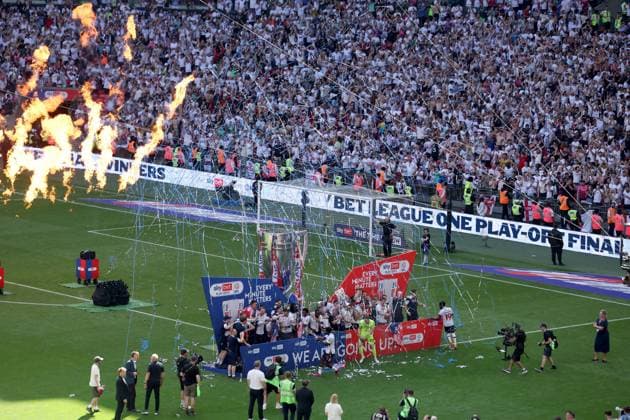 Bolton Wanderers celebrate with the trophy after winning the EFL Championship Play-off Final and promotion to the Premier League Bolton Wanderers v Stockport County, EFL Sky Bet League One, Play-Off Final, Football, Wembley Stadium, London, UK - 24 May 2026London Wembley Stadium United Kingdom EDITORIAL USE ONLY No use with unauthorised audio, video, data, fixture lists, club league logos or live services. Online in-match use limited to 120 images, no video emulation. No use in betting, games or single club league player publications. Copyright: xIanxTuttle Shutterstockx 16889808dw