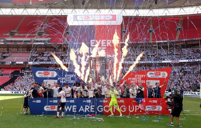 League One Play off final Winning club celebrations on winners boards, Bolton Wanderers players Bolton Wanderers v Stockport County, EFL Sky Bet League One, Play-Off Final, Football, Wembley Stadium, London, UK - 24 May 2026London Wembley Stadium United Kingdom EDITORIAL USE ONLY No use with unauthorised audio, video, data, fixture lists, club league logos or live services. Online in-match use limited to 120 images, no video emulation. No use in betting, games or single club league player publications. Copyright: xAndrewxFosker Shutterstockx 16889807bu