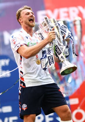Sam Dalby of Bolton Wanderers celebrates with the League One Play off final trophy Bolton Wanderers v Stockport County, EFL Sky Bet League One, Play-Off Final, Football, Wembley Stadium, London, UK - 24 May 2026London Wembley Stadium United Kingdom EDITORIAL USE ONLY No use with unauthorised audio, video, data, fixture lists, club league logos or live services. Online in-match use limited to 120 images, no video emulation. No use in betting, games or single club league player publications. Copyright: xJamesxMarsh Shutterstockx 16889809dg