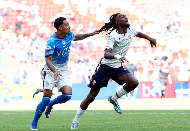 Josh Dacres-Cogley of Stockport County pulls the hair of Ibrahim Cissoko of Bolton Wanderers Bolton Wanderers v Stockport County, EFL Sky Bet League One, Play-Off Final, Football, Wembley Stadium, London, UK - 24 May 2026London Wembley Stadium United Kingdom EDITORIAL USE ONLY No use with unauthorised audio, video, data, fixture lists, club league logos or live services. Online in-match use limited to 120 images, no video emulation. No use in betting, games or single club league player publications. Copyright: xSimonxDael Shutterstockx 16889811ht