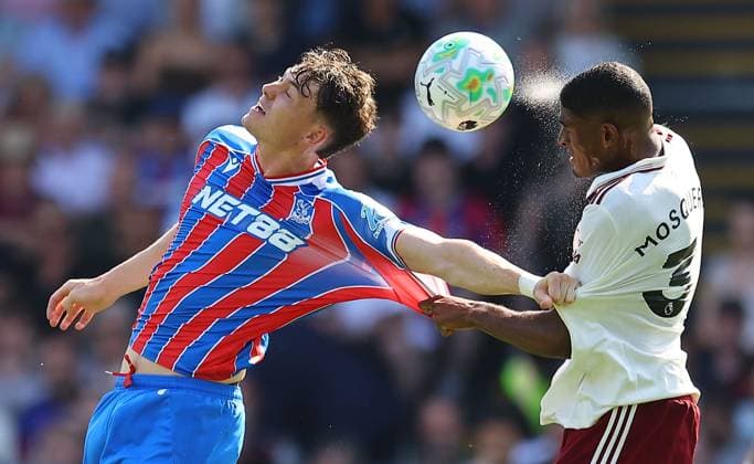 Jorgen Strand Larsen of Crystal Palace competes for the ball with Cristhian Mosquera of Arsenal Crystal Palace v Arsenal, Premier League, Football, Selhurst Park, London, UK - 24 May 2026London Selhurst Park United Kingdom EDITORIAL USE ONLY No use with unauthorised audio, video, data, fixture lists, club league logos or live services. Online in-match use limited to 120 images, no video emulation. No use in betting, games or single club league player publications. Copyright: xMichaelxZemanek Shutterstockx 16889837ab