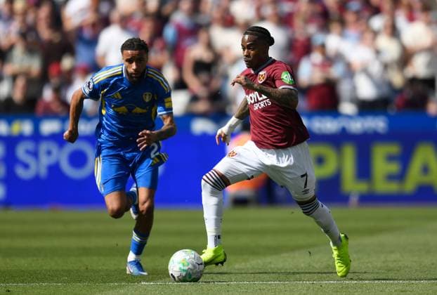 Crysencio Summerville of West Ham United in action with Jayden Bogle of Leeds United West Ham United v Leeds United, Premier League, Football, London Stadium, London, UK - 24 May 2026London London Stadium United Kingdom EDITORIAL USE ONLY No use with unauthorised audio, video, data, fixture lists, club league logos or live services. Online in-match use limited to 120 images, no video emulation. No use in betting, games or single club league player publications. Copyright: xAlanxWalter Shutterstockx 16889881s