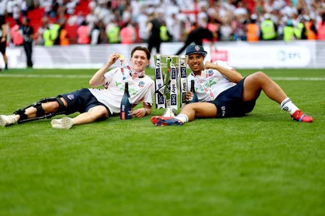 Charlie Warren and Ethan Erhahon of Bolton Wanderers celebrate after winning the Sky Bet EFL League One Play-off Final and promotion to the Sky Bet EFL Championship Bolton Wanderers v Stockport County, EFL Sky Bet League One, Play-Off Final, Football, Wembley Stadium, London, UK - 24 May 2026London Wembley Stadium United Kingdom EDITORIAL USE ONLY No use with unauthorised audio, video, data, fixture lists, club league logos or live services. Online in-match use limited to 120 images, no video emulation. No use in betting, games or single club league player publications. Copyright: xSimonxDael Shutterstockx 16889811ir