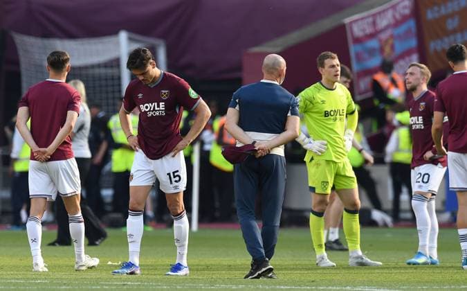 Konstantinos Mavropanos ,Mads Hermansen and Jarrod Bowen of West Ham United look dejected at the end of the match West Ham United v Leeds United, Premier League, Football, London Stadium, London, UK - 24 May 2026London London Stadium United Kingdom EDITORIAL USE ONLY No use with unauthorised audio, video, data, fixture lists, club league logos or live services. Online in-match use limited to 120 images, no video emulation. No use in betting, games or single club league player publications. Copyright: xAlanxWalter Shutterstockx 16889881ap
