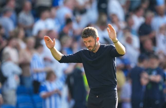 Michael Carrick manager of Manchester United, ManU bows to the travelling fans at the end of the game. Brighton and Hove Albion v Manchester United, Premier League, Football, American Express Community Stadium, Brighton, UK - 24 May 2026Brighton American Express Community Stadi United Kingdom EDITORIAL USE ONLY No use with unauthorised audio, video, data, fixture lists, club league logos or live services. Online in-match use limited to 120 images, no video emulation. No use in betting, games or single club league player publications. Copyright: xSeanxRyan Shutterstockx 16889822bm