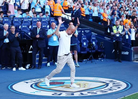 Manchester City manager Pep Guardiola walks across the club crest onto the pitch for the last time Manchester City v Aston Villa, Premier League, Football, Etihad Stadium, Manchester, UK - 24 May 2026Manchester Etihad Stadium United Kingdom EDITORIAL USE ONLY No use with unauthorised audio, video, data, fixture lists, club league logos or live services. Online in-match use limited to 120 images, no video emulation. No use in betting, games or single club league player publications. Copyright: xMattxWest Shutterstockx 16889851bb