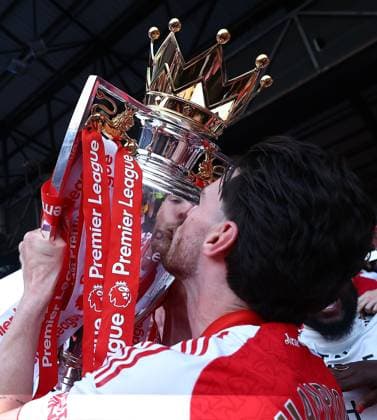 Declan Rice of Arsenal celebrates with the Premier League trophy Crystal Palace v Arsenal, Premier League, Football, Selhurst Park, London, UK - 24 May 2026London Selhurst Park United Kingdom EDITORIAL USE ONLY No use with unauthorised audio, video, data, fixture lists, club league logos or live services. Online in-match use limited to 120 images, no video emulation. No use in betting, games or single club league player publications. Copyright: xMichaelxZemanek Shutterstockx 16889837bn