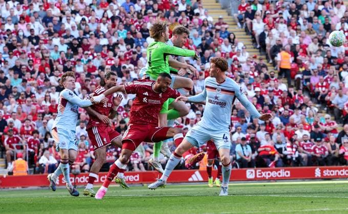 Liverpool s Cody Gakpo battles with Brentford s Caoimhin Kelleher and Nathan Collins Liverpool v Brentford, Premier League, Football, Anfield, Liverpool, UK - 24 May 2026Liverpool Anfield United Kingdom EDITORIAL USE ONLY No use with unauthorised audio, video, data, fixture lists, club league logos or live services. Online in-match use limited to 120 images, no video emulation. No use in betting, games or single club league player publications. Copyright: xAlexxDodd Shutterstockx 16889846cj