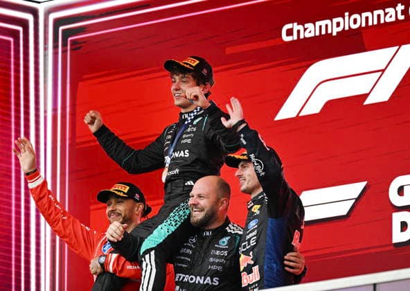May 24, 2026, Montreal, Qc, CANADA: First place finisher Mercedes driver Kimi Antonelli of Italy, centre, is held aloft by second place finisher, Ferrari driver Lewis Hamilton of the United Kingdom, left, Mercedes senior composite technician Dean Hale, second right, and third place finisher, Red Bull Racing driver Max Verstappen of the Netherlands, following his win at Formula One auto racing Canadian Grand Prix in Montreal on Sunday, May 24, 2026. Canada News - May 24, 2026 - ZUMAc35_ 20260524_zaf_c35_129 Copyright: xGrahamxHughesx