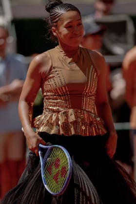 Naomi Osaka of Japan wears a gold sequinned dress under a black sequinned long skirt and corset French Open Tennis, Day Three, Tennis, Roland Garros, Paris, France - 26 May 2026Paris Roland Garros France EDITORIAL USE ONLY No use with unauthorised audio, video, data, fixture lists, club league logos or live services. Online in-match use limited to 120 images, no video emulation. No use in betting, games or single club league player publications. Copyright: xEllaxLing Shutterstockx 16898259a