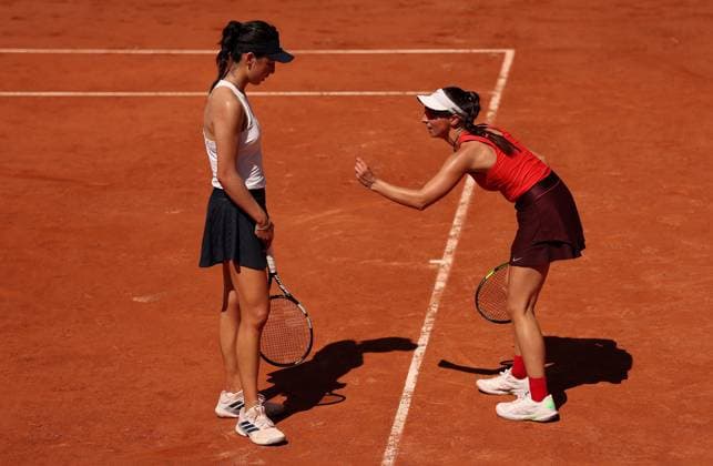 Xinyu Wang of China and Tamara Korpatsch of Germany argue a line call on the same side of the court French Open Tennis, Day Four, Tennis, Roland Garros, Paris, France - 27 May 2026Paris Roland Garros France EDITORIAL USE ONLY No use with unauthorised audio, video, data, fixture lists, club league logos or live services. Online in-match use limited to 120 images, no video emulation. No use in betting, games or single club league player publications. Copyright: xEllaxLing Shutterstockx 16898262ds