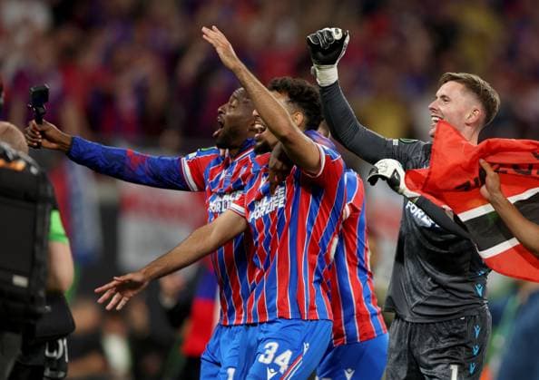 (Left to right) Jean-Philippe Mateta, Chadi Riad and Dean Henderson of Crystal Palace celebrate winning the UEFA Conference League Crystal Palace v Rayo Vallecano, UEFA Conference League, Final, Football, Red Bull Arena, Leipzig, Germany - 27 May 2026Leipzig Red Bull Arena Germany EDITORIAL USE ONLY No use with unauthorised audio, video, data, fixture lists, club league logos or live services. Online in-match use limited to 120 images, no video emulation. No use in betting, games or single club league player publications. Copyright: xKieranxMcManus Shutterstockx 16898266dn