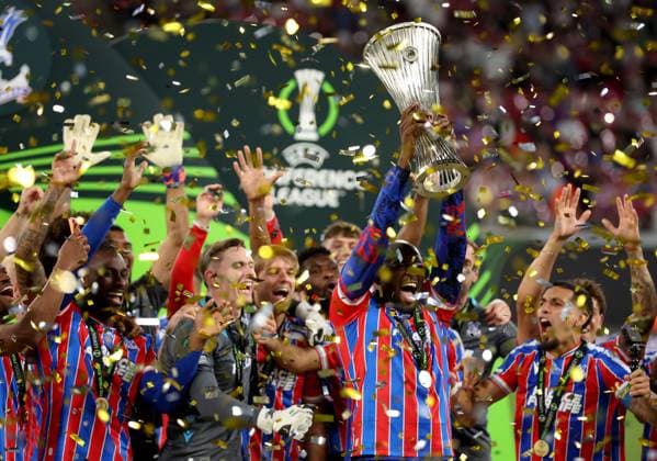 Jean-Philippe Mateta of Crystal Palace celebrates with the trophy after winning the UEFA Conference League Crystal Palace v Rayo Vallecano, UEFA Conference League, Final, Football, Red Bull Arena, Leipzig, Germany - 27 May 2026Leipzig Red Bull Arena Germany EDITORIAL USE ONLY No use with unauthorised audio, video, data, fixture lists, club league logos or live services. Online in-match use limited to 120 images, no video emulation. No use in betting, games or single club league player publications. Copyright: xKieranxMcManus Shutterstockx 16898266dy