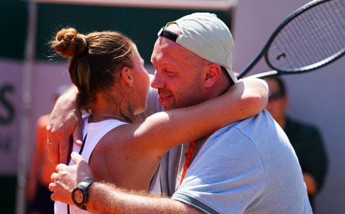 Oleksandra Oliynykova hugs her father Denis, currently on leave from the Ukrainian army to watch his daughter play, after making round three with a three set win over Kimberly Birrell French Open Tennis, Day Five, Tennis, Roland Garros, Paris, France - 28 May 2026Paris Roland Garros France EDITORIAL USE ONLY No use with unauthorised audio, video, data, fixture lists, club league logos or live services. Online in-match use limited to 120 images, no video emulation. No use in betting, games or single club league player publications. Copyright: xJavierxGarcia Shutterstockx 16898263a