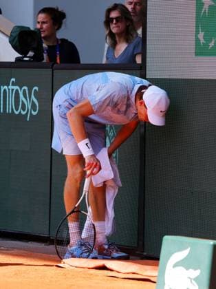 Jannik Sinner wretches at the back of the court as Amelie Mauresmo looks on French Open Tennis, Day Five, Tennis, Roland Garros, Paris, France - 28 May 2026Paris Roland Garros France EDITORIAL USE ONLY No use with unauthorised audio, video, data, fixture lists, club league logos or live services. Online in-match use limited to 120 images, no video emulation. No use in betting, games or single club league player publications. Copyright: xJavierxGarcia Shutterstockx 16898263o