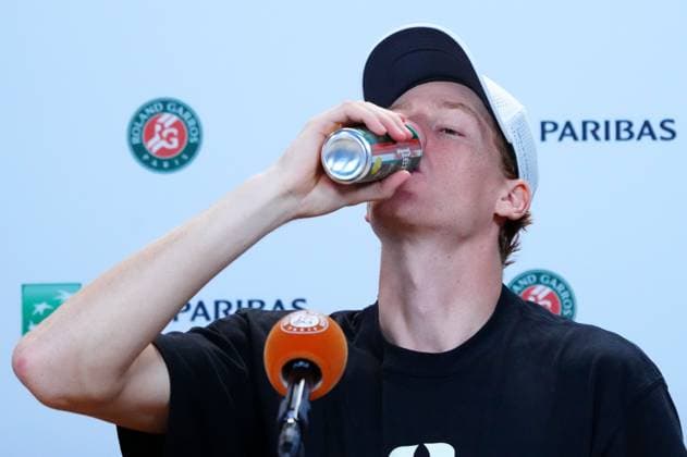 Jannik Sinner downs some Perrier during his press conference, PK, Pressekonferenz after his second round loss in which he announced that his next tournament would be Wimbledon French Open Tennis, Day Five, Tennis, Roland Garros, Paris, France - 28 May 2026Paris Roland Garros France EDITORIAL USE ONLY No use with unauthorised audio, video, data, fixture lists, club league logos or live services. Online in-match use limited to 120 images, no video emulation. No use in betting, games or single club league player publications. Copyright: xJavierxGarcia Shutterstockx 16898263ai
