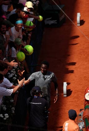 Mouise Kouame of France celebrates with fans French Open Tennis, Day Five, Tennis, Roland Garros, Paris, France - 28 May 2026Paris Roland Garros France EDITORIAL USE ONLY No use with unauthorised audio, video, data, fixture lists, club league logos or live services. Online in-match use limited to 120 images, no video emulation. No use in betting, games or single club league player publications. Copyright: xEllaxLing Shutterstockx 16898264bj