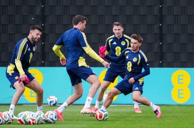 Grant Hanley of Scotland (far left) & Billy Gilmour of Scotland (right). Scotland Team Training, Football, Hampden Park, Glasgow, Scotland, UK - 29 May 2026Glasgow Hampden Park United Kingdom EDITORIAL USE ONLY No use with unauthorised audio, video, data, fixture lists, club league logos or live services. Online in-match use limited to 120 images, no video emulation. No use in betting, games or single club league player publications. Copyright: xStuartxWallace Shutterstockx 16902976ad