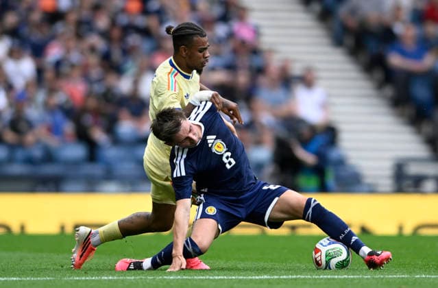 Glasgow, Scotland, 30th May 2026. Juninho Bacuna of Curacao and Billy Gilmour of Scotland during the Scotland vs Curacao International Friendly, Länderspiel, Nationalmannschaft match at Hampden Park, Glasgow. Picture credit should read: Neil Hanna Sportimage EDITORIAL USE ONLY. No use with unauthorised audio, video, data, fixture lists, club league logos or live services. Online in-match use limited to 120 images, no video emulation. No use in betting, games or single club league player publications. SPI_082_NH_Scotland_Curacao SPI-4830-0082