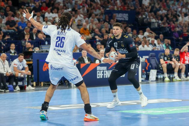 31.05.2026 ,xgox, Handball - Handball - EHF European League, Spiel um Platz 3 Montpellier Handball - SG Flensburg-Handewitt emspor, v.l. Hugo Bryan Monte Dos Santos (Montepellier, 26), Marko Grgic (Flensburg, 17) Zweikampf, Duell, Kampf, tackle Hamburg