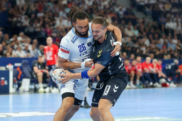 31.05.2026 ,xgox, Handball - Handball - EHF European League, Spiel um Platz 3 Montpellier Handball - SG Flensburg-Handewitt emspor, v.l. Hugo Bryan Monte Dos Santos (Montepellier, 26), Kent Robin Tonnesen (Tönnesen, Flensburg, 23) Zweikampf, Duell, Kampf, tackle Hamburg