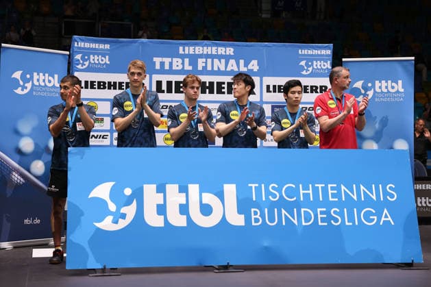 Borussia Düsseldorf players react with disappointment after finishing as runners-up in the German championship Kanak Jha (GER,USA Borussia Duesseldorf), Anton Kaellberg (SWE, Borussia Duesseldorf), Borgar Haug (NOR, Borussia Duesseldorf), Dang Qiu (GER, Borussia Duesseldorf), Yongyin Li (CHN,Borussia Duesseldorf) and Trainer Danny Heister (NED, Borussia Duesseldorf) during the final matches of the Liebherr TTBL Final4 Borussia Düsseldorf - FC Saarbrücken Tischtennis at the Süwag Energie ARENA on May 31, 2026, in Frankfurt, Germany Frankfurt Süwag Energie ARENA Hessen Germany Copyright: xJoaquimxFerreirax