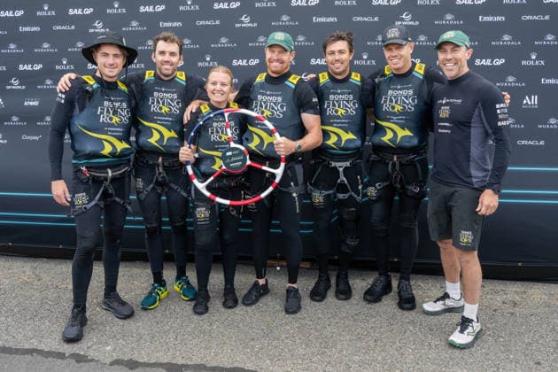 2026 Rolex SailGP Championship Mubadala New York Sail Grand Prix - Day 2, USA - 31 May 2026 Tom Johnson, wing trimmer of ROCKWOOL Racing SailGP Team, Jason Waterhouse, flight controller of BONDS Flying Roos SailGP Team, Tash Bryant, strategist of BONDS Flying Roos, Tom Slingsby, driver of BONDS Flying Roos SailGP Team, Iain Jensen, wing trimmer of BONDS Flying Roos SailGP Team, Sam Newton, grinder of BONDS Flying Roos SailGP Team, and Kinley Fowler, grinder of BONDS Flying Roos SailGP Team, celebrate winning the Mubadala New York Sail Grand Prix at New York Harbor. New York United States Copyright: xRonxAdarx xSOPAxImagesx _radar_sailgp_20260531_02914