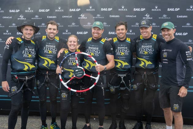 2026 Rolex SailGP Championship Mubadala New York Sail Grand Prix - Day 2, USA - 31 May 2026 Tom Johnson, wing trimmer of ROCKWOOL Racing SailGP Team, Jason Waterhouse, flight controller of BONDS Flying Roos SailGP Team, Tash Bryant, strategist of BONDS Flying Roos, Tom Slingsby, driver of BONDS Flying Roos SailGP Team, Iain Jensen, wing trimmer of BONDS Flying Roos SailGP Team, Sam Newton, grinder of BONDS Flying Roos SailGP Team, and Kinley Fowler, grinder of BONDS Flying Roos SailGP Team, celebrate winning the Mubadala New York Sail Grand Prix at New York Harbor. New York United States Copyright: xRonxAdarx xSOPAxImagesx _radar_sailgp_20260531_02926