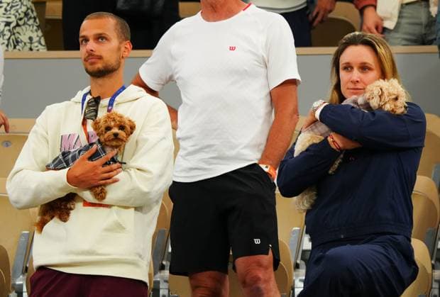 The dogs of Marta Kostyuk make an appearance during her on court interview after her win over Elina Svitolina French Open Tennis, Day Ten, Tennis, Roland Garros, Paris, France - 02 Jun 2026Paris Roland Garros France EDITORIAL USE ONLY No use with unauthorised audio, video, data, fixture lists, club league logos or live services. Online in-match use limited to 120 images, no video emulation. No use in betting, games or single club league player publications. Copyright: xJavierxGarcia Shutterstockx 16906549o