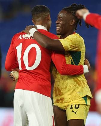 Brandon Thomas-Asante of Ghana hugs Kai Andrews of Wales at full time Wales v Ghana, International Friendly, Länderspiel, Nationalmannschaft Football, Cardiff City Stadium, Cardiff, Wales, UK - 02 Jun 2026Cardiff Cardiff City Stadium United Kingdom EDITORIAL USE ONLY No use with unauthorised audio, video, data, fixture lists, club league logos or live services. Online in-match use limited to 120 images, no video emulation. No use in betting, games or single club league player publications. Copyright: xKieranxMcManus Shutterstockx 16906575bi